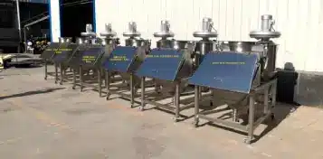 Pharmaceutical Powder Feeding into Mixer Powder feeding into pharmaceutical mixer